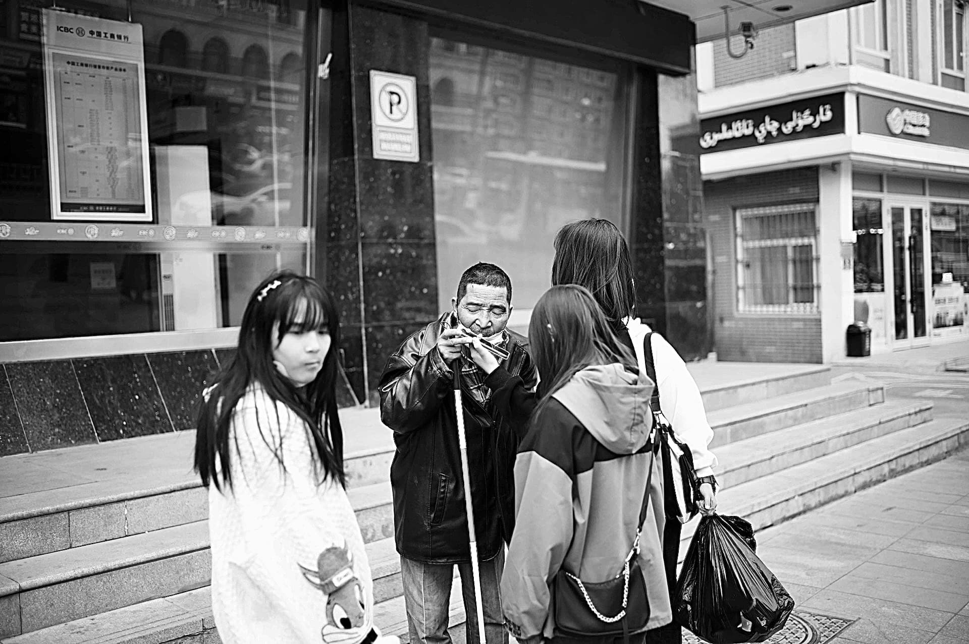 Several girls are helping blind people